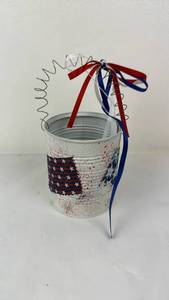 lot 75 image: Patriotic Speckled Metal Bucket with Coiled Handle and Ribbon Decorations