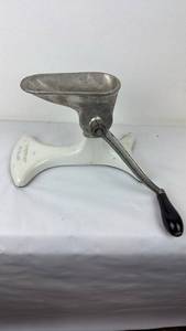 lot 91 image: Antique Food Grinder Attachment with White Handle