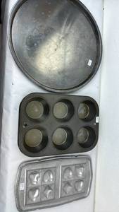 lot 98 image: Baking Pan Lot Round and Muffin Tins 3 Pieces