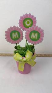 lot 107 image: MOM Decorative Flower Pot Arrangement with Pink Flowers and Green Leaves