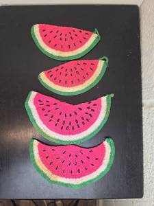 lot 136 image: Crocheted Watermelon Slice Coasters or Decorations Set of 4