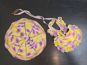 lot 137 image: Crocheted Doily and Bonnet Set Purple Yellow Pink with Ribbons