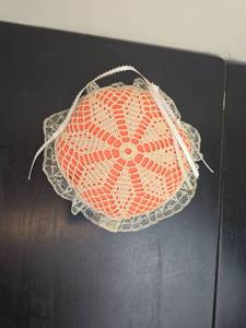 lot 157 image: Handmade Crocheted Doily Red Orange and Cream with Lace Trim