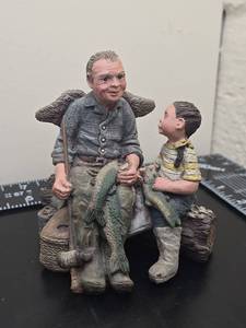 lot 169 image: Sarahs Attick Figurine Depicting Adult and Child with Fish