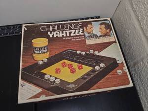 lot 213 image: Challenge Yahtzee Dice Game with Scoring Mat and Dice Cup