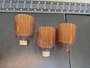 lot 219 image: 3 Amber Glass Ribbed CandleVotive Holders