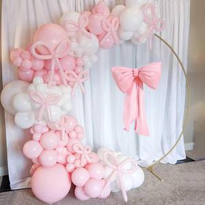lot 10146 image: Coquette Pink Bow Balloon Arch Kit - 114pc Pastel & White Garland