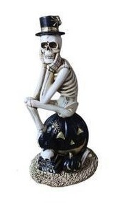 lot 10362 image: Skeleton Sitting on Pumpkin Halloween Decorative Figure