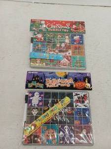 lot 10411 image: Lot of 2 Holiday And Halloween Puzzle Toys