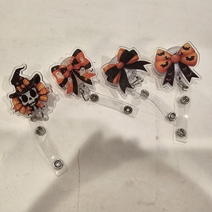 lot 2353 image: Lot of 4 Halloween Badge ReelsOrange Black Badge Reels