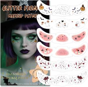 lot 2529 image: Lot of 2, Glitter Freckles, Holographic Face and Body Glitter Tattoo Sparkle for Women Gold Glow Cosmetic Star Makeup Accessories for Festival Rave (6pcs Halloween)