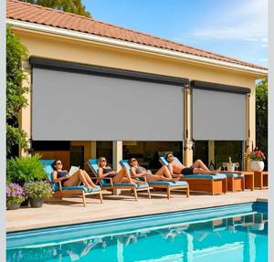 lot 21 image: Outdoor Roller Shade for Patio with Aluminum Valance, (10W X 8H) 420GSM New Material Patio Blinds with 95% UV Blockout, Outdoor Blinds with Crank Handle for Shading, Privacy Protection, Gray - Retail $219