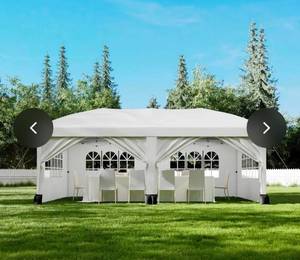 lot 39 image: Garvee Pop Up Canopy Tent, 10 x 20 FT White Commercial Gazebo with 6 Sidewalls, Adjustable Height and Waterproof Cover for Parties, Weddings and Events - Retail $259