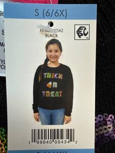 lot 4304 image: Zunie Girl Sequined Trick-or-Treat Sweater, girls size small (66x)
