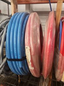 lot 19429 image: PEX Tubing Coil Assortment - Blue & Red Rolls