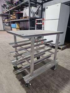 lot 7798 image: New Age Industrial NSF Aluminum Work Cart w Shelves