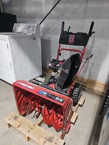 lot 160801 image: Troy-Bilt Storm 24in 2-Stage Snow Blower