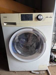 lot 7943 image: Haier Combination Washer-Dryer  Model HLC1700AXW