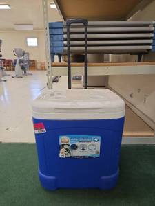 lot 1093 image: Igloo Ice Cube 60 Quart Wheeled Cooler