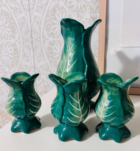 lot 44402 image: Big Lot Leaf-Shaped Ceramic Pitcher and Small Vases, pitchers, candle holders, salt and pepper shakers, candles and sniffer.