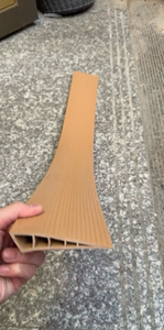 lot 44549 image: Approx 39 12 L.  Tan Ribbed Hollow-Channel Threshold Molding Strip