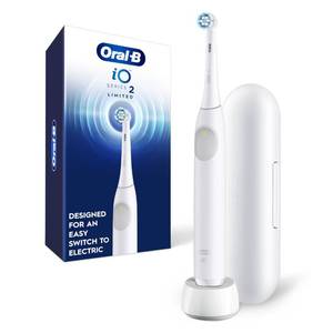 lot 18502 image: Oral-B Rechargeable Electric Toothbrush, iO Limited Simple Clean, 3 Cleaning Modes, Automatic Pressure Sensor to Protect Gums, Travel Case, White - Retail $70
