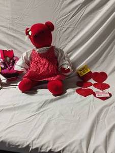 lot 34731 image: Plush Valentines stuffed animal, along with 6 heart-shaped coasters