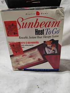 lot 34756 image: Sunbeam heat and go warm pack