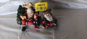 lot 34674 image: A pair of vintage resinceramic Santa Claus Christmas figurines