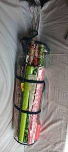 lot 34677 image: Large bag of assorted Christmas wrapping paper in various amounts