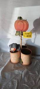 lot 34701 image: OutdoorIndoor Pumpkin decor with planters, along with Trick or Treat fabric