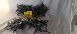 lot 34716 image: Two bundles of small, multi-colored Christmas lights