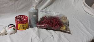 lot 34719 image: Bundle of Christmas decor, snowman nightlight, silver candle with red candle holder, and red artificial plant figs