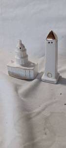 lot 34724 image: Vintage white ceramicporcelain souvenir salt or pepper shaker shaped like the U.S. Capitol Building, featuring gold-toned accents