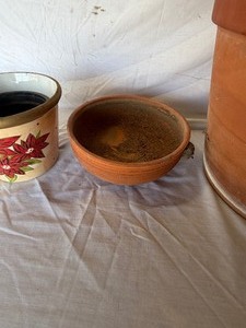 lot 34787 image: Three plant pots, one large and two medium-sized