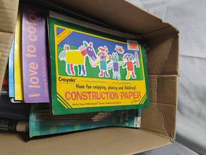 lot 35015 image: Bundle of art supplies, crayons, paint brushes, colored markers, pencils, posters you can color, bundle of glue sticks, variety of balloon ribbon colors, multi colored confeti, variety of craft paint colors.