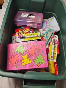 lot 35016 image: Storage tub of art and craft supplies, crayons, scissors, pencils, glue sticks, coloring books, sharpie markers, notepad, hole punch, etc.