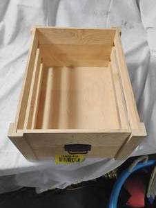 lot 35043 image: Decorative wooden storage box with a metal handle on the front