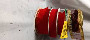 lot 34965 image: Christmas ribbon rolls in an assortment of colors and sizes