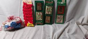 lot 34966 image: Christmas present bows, Christmas ribbons, 3 packages of Christmas gift folds