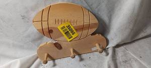 lot 35066 image: Wooden football coat rack wall hanging