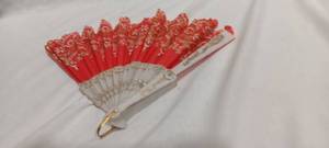 lot 35102 image: Red, cream and gold hand fan