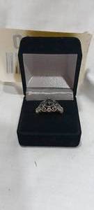 lot 35110 image: Vintage-style ring features intricate scrollwork filigree framing its two dark oval stones