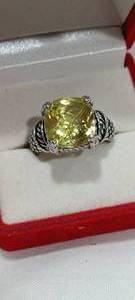 lot 35111 image: Silver ring with Yellow center stone