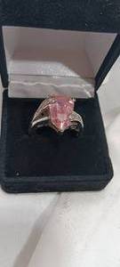 lot 35113 image: Silver ring with Pink center stone