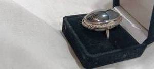 Silver ring with black center stone