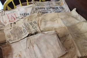 lot 4457 image: Vintage Lumber Yard Nail Aprons