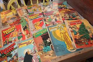 lot 4488 image: Antique 1940s-50s Treasure Chest Comic Books