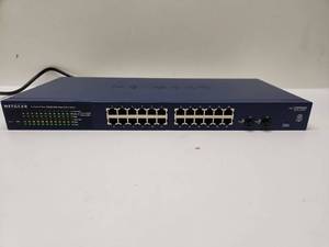 lot 23 image: NETGEAR ProSafe 24 Port 101001000 Mbps Smart Switch GS724T