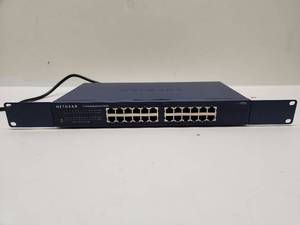 lot 25 image: NETGEAR ProSafe 24 Port Gigabit Switch JGS524